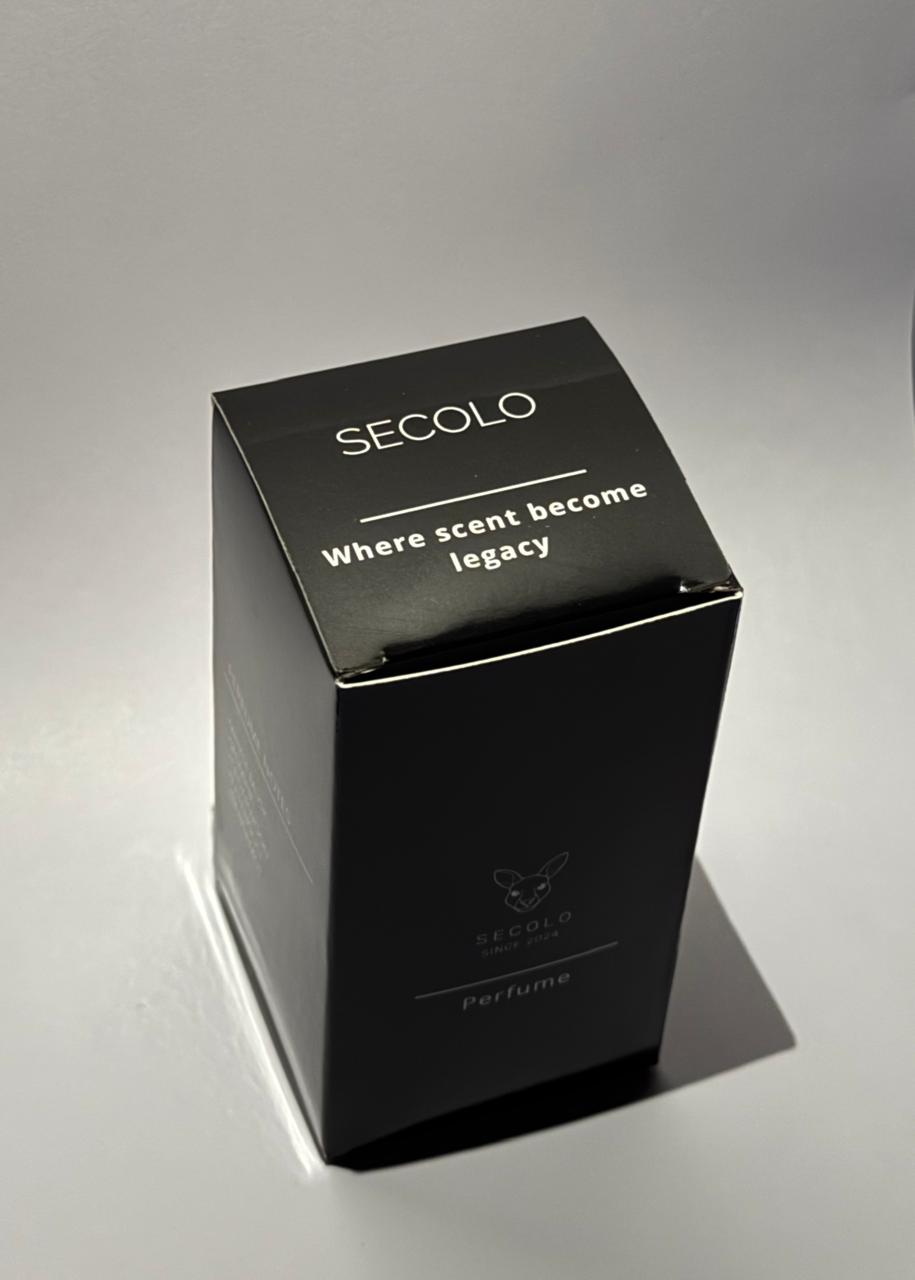 Black perfume box with 'Secolo' branding on a gray background